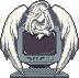 Angel resting upon a computer